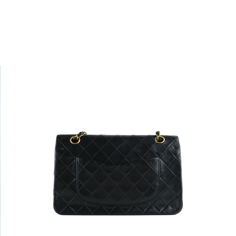 CHANEL - Sac à main Timeless 25 double flap en cuir matelassé noir vintage