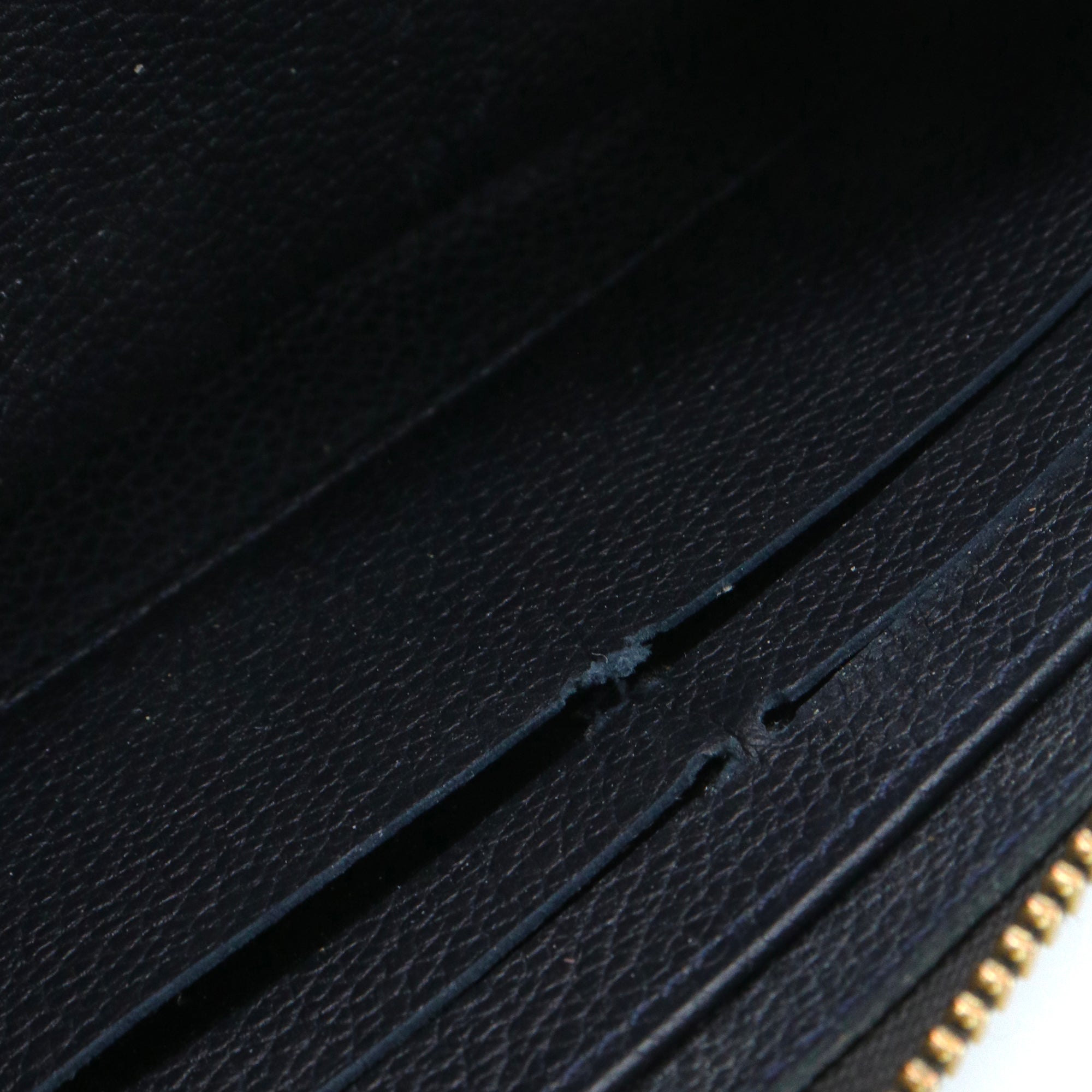 LOUIS VUITTON - Portefeuille Zippy Louis Vuitton en cuir empreinte bleu marine