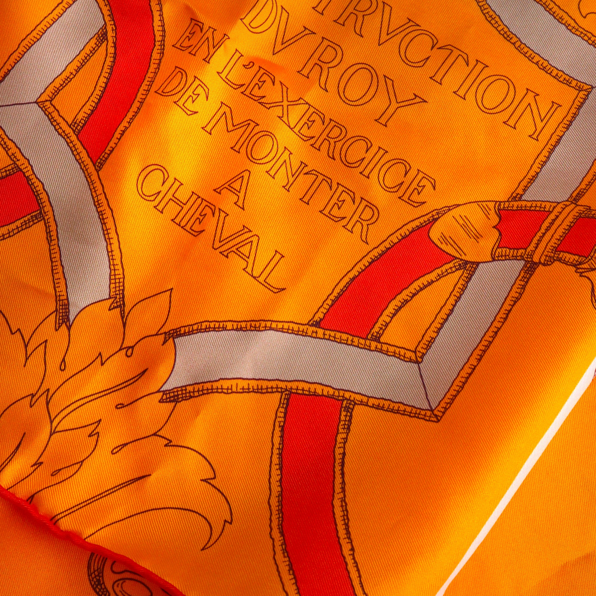 HERMÈS - Echarpe de soie L'Instruction du Roy Bayadère Hermès en soie orange