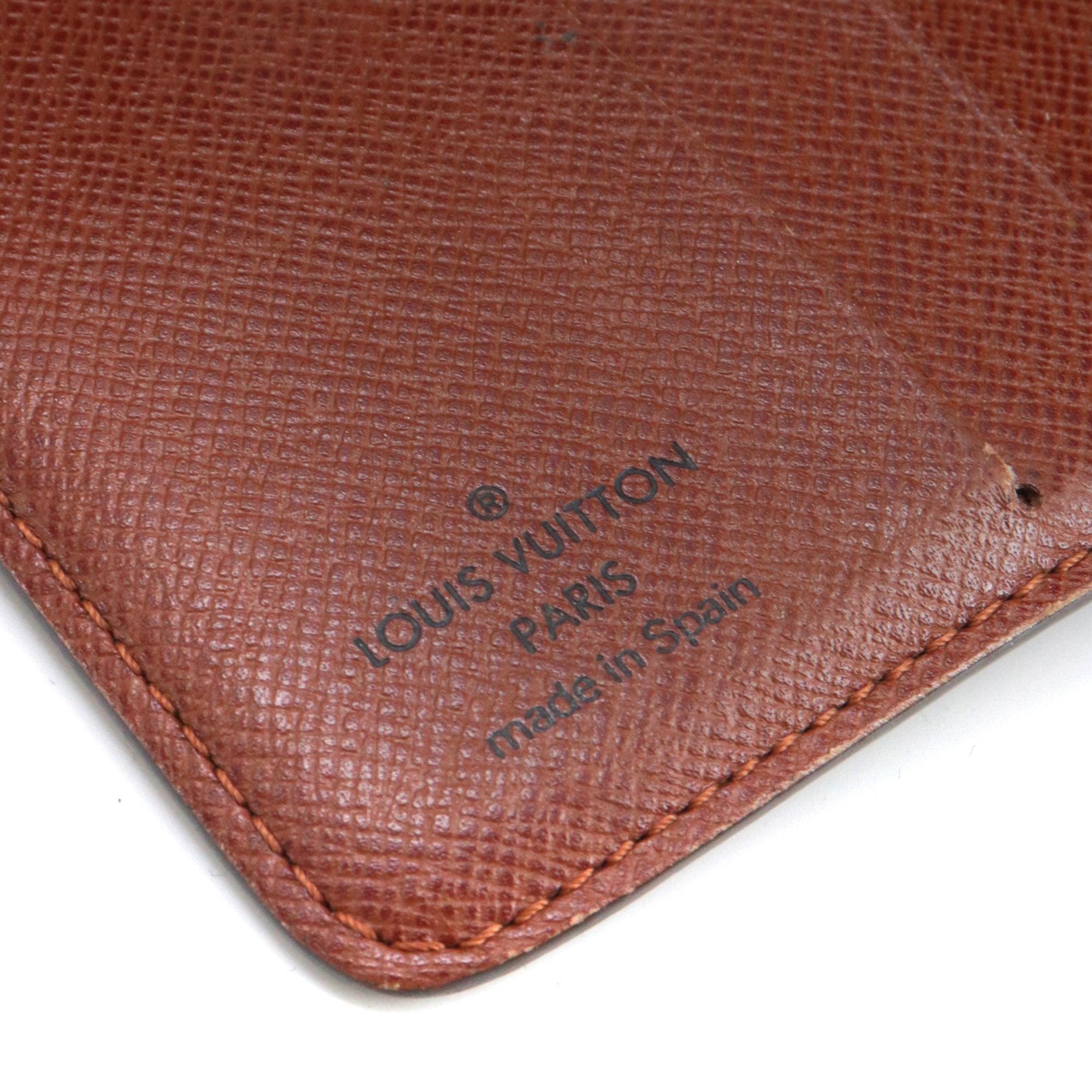 LOUIS VUITTON - Porte-monnaie Louis Vuitton en toile monogrammée