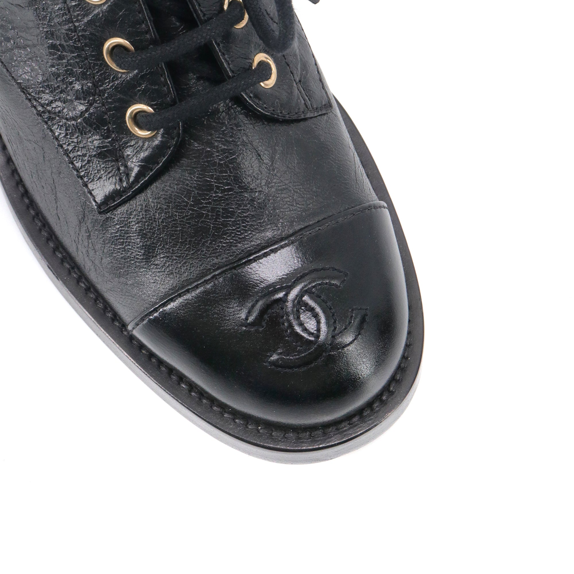 CHANEL - Chanel black leather ankle boots (size 37.5)