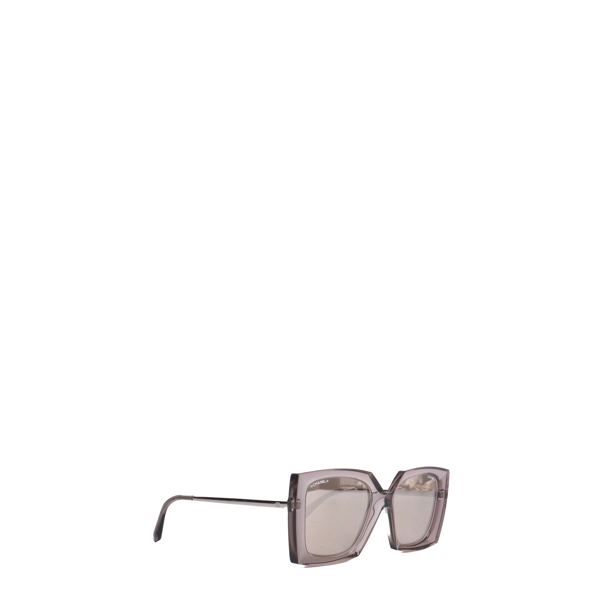 CHANEL - Lunettes de soleil Chanel en plastique transparent