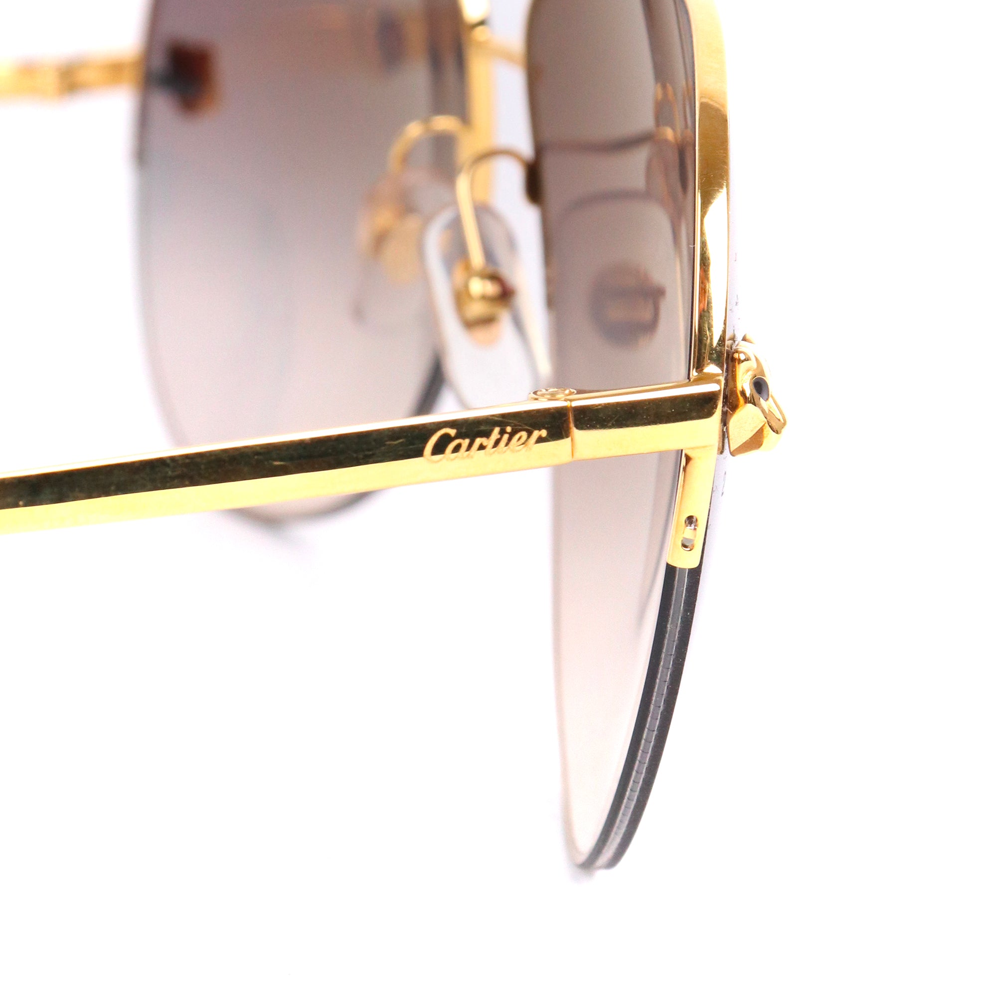 CARTIER - Lunettes de soleil Panthère Cartier en métal doré