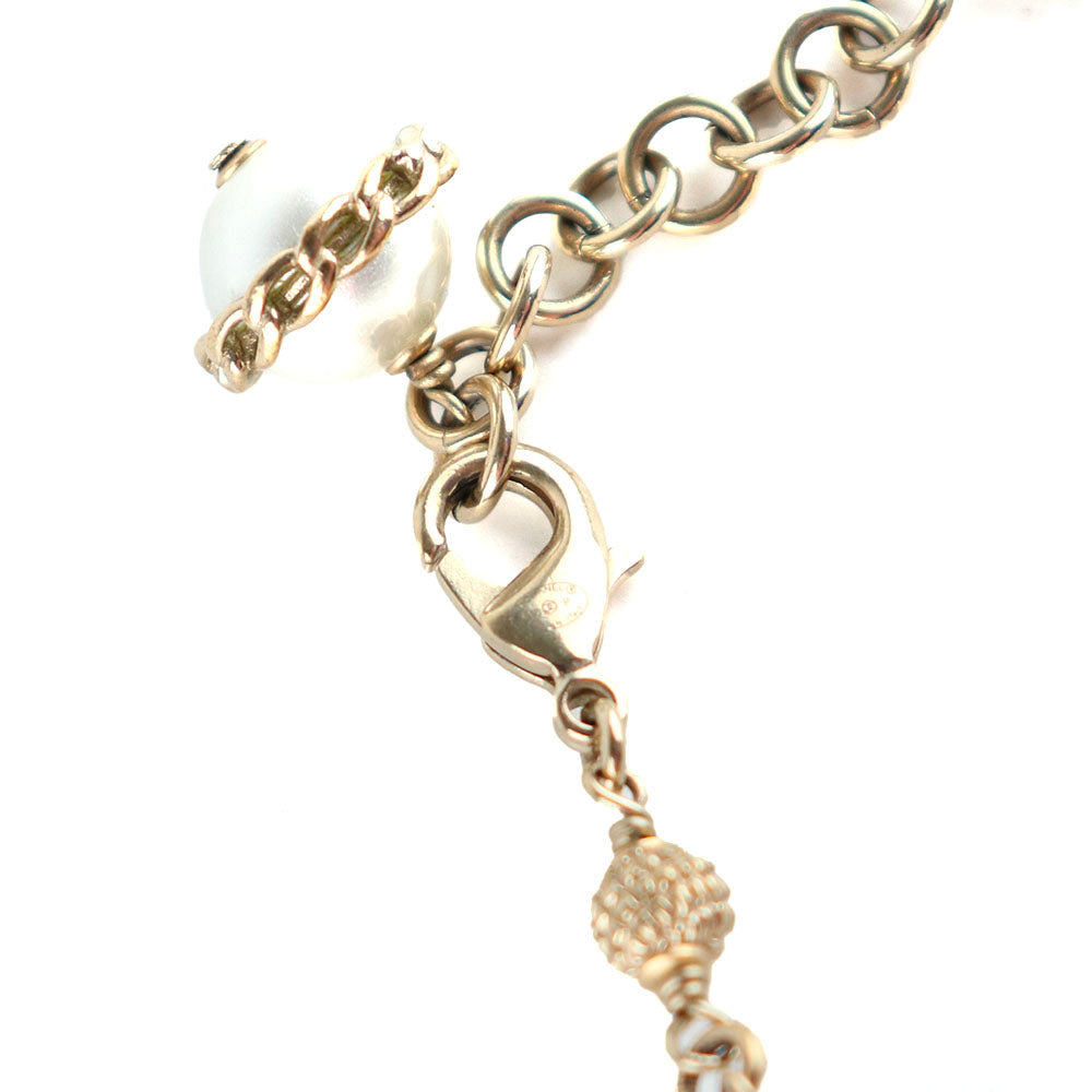 CHANEL - Bracelet CC avec perles
