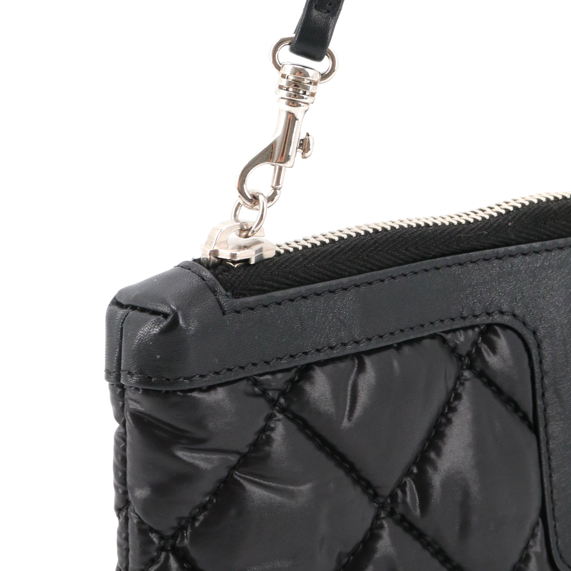 CHANEL - Pochette Cocoon Chanel en toile noire