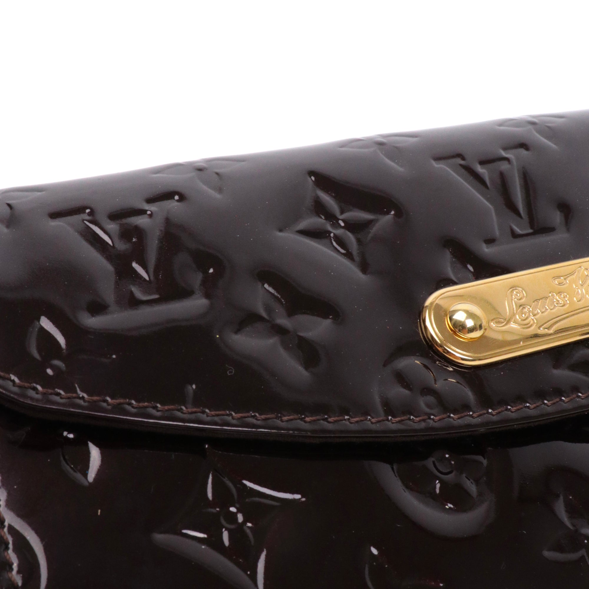 LOUIS VUITTON - Pochette Sunset Boulevard Louis Vuitton en cuir verni bordeaux