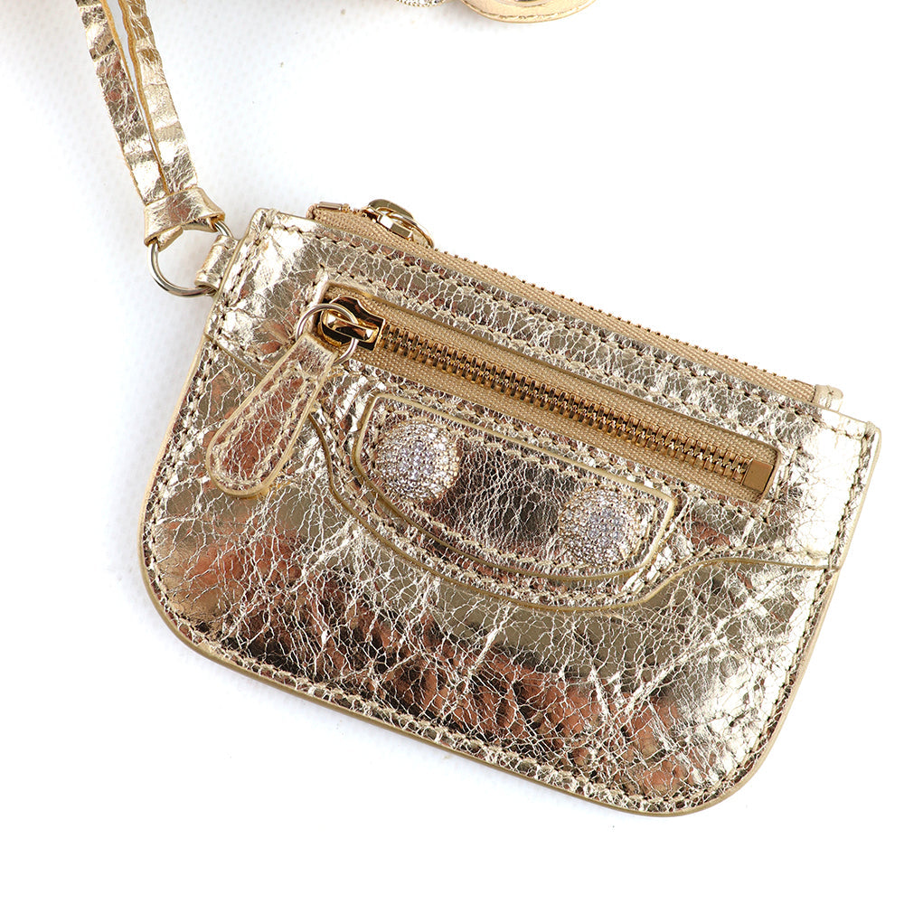 BALENCIAGA - Cagole XS rhinestone shoulder bag in gold leather