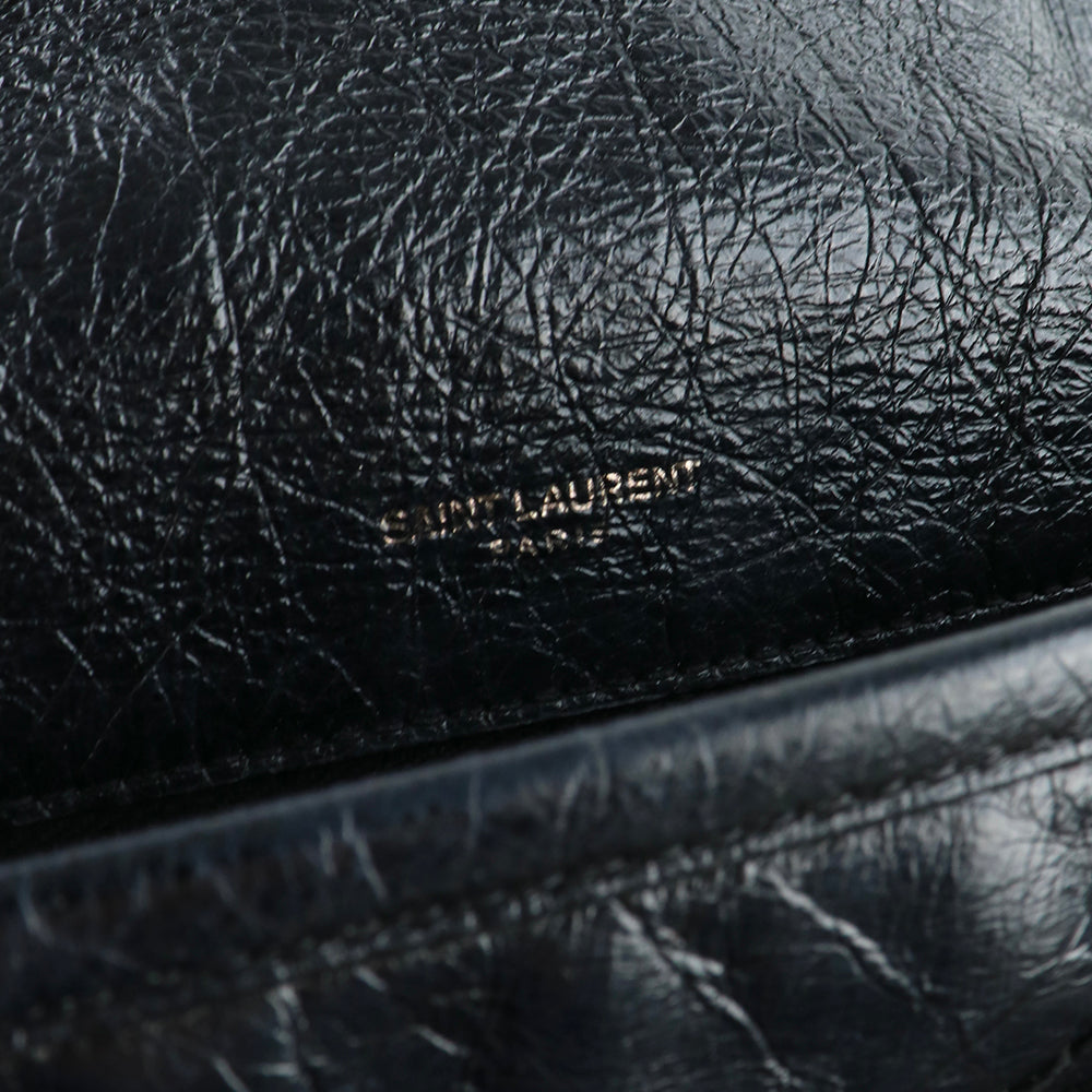 SAINT LAURENT - Sac à bandoulière Niki Medium en cuir noir
