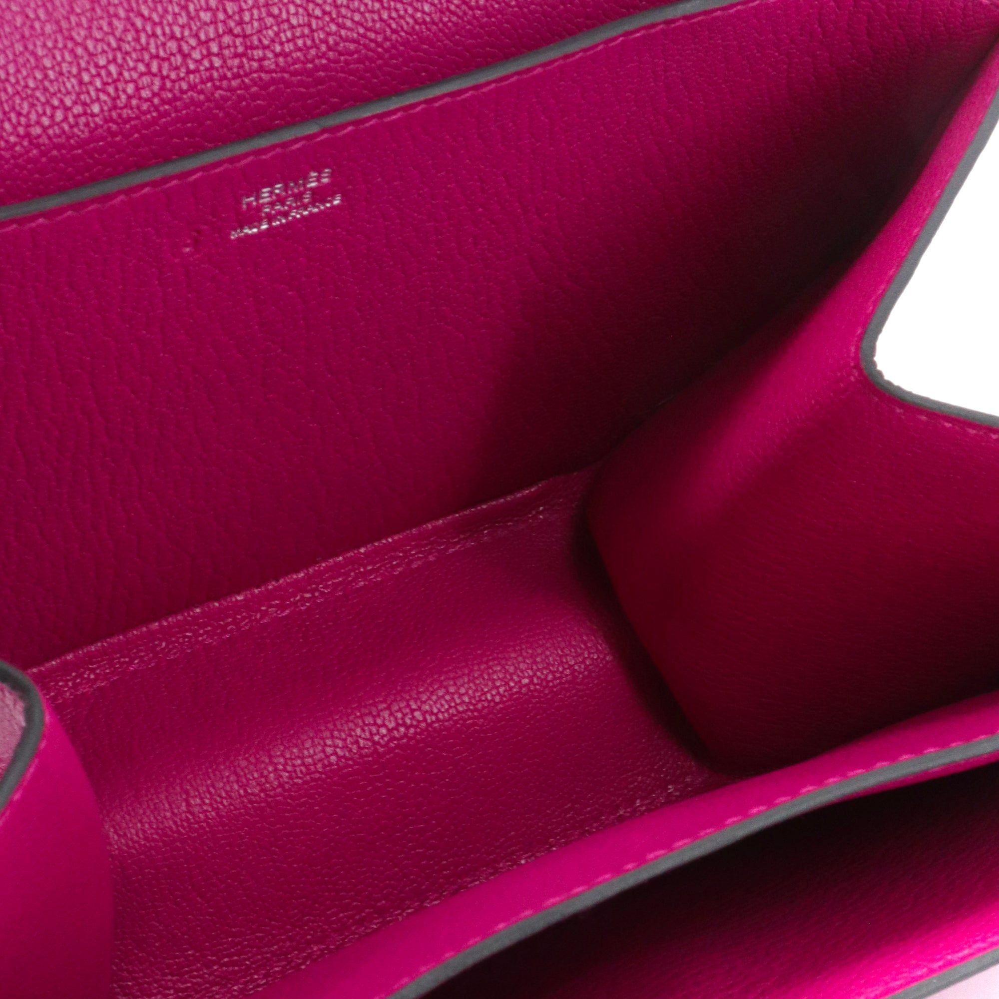 HERMÈS - Pochette Opli Hermès en cuir de chèvre rose pourpre