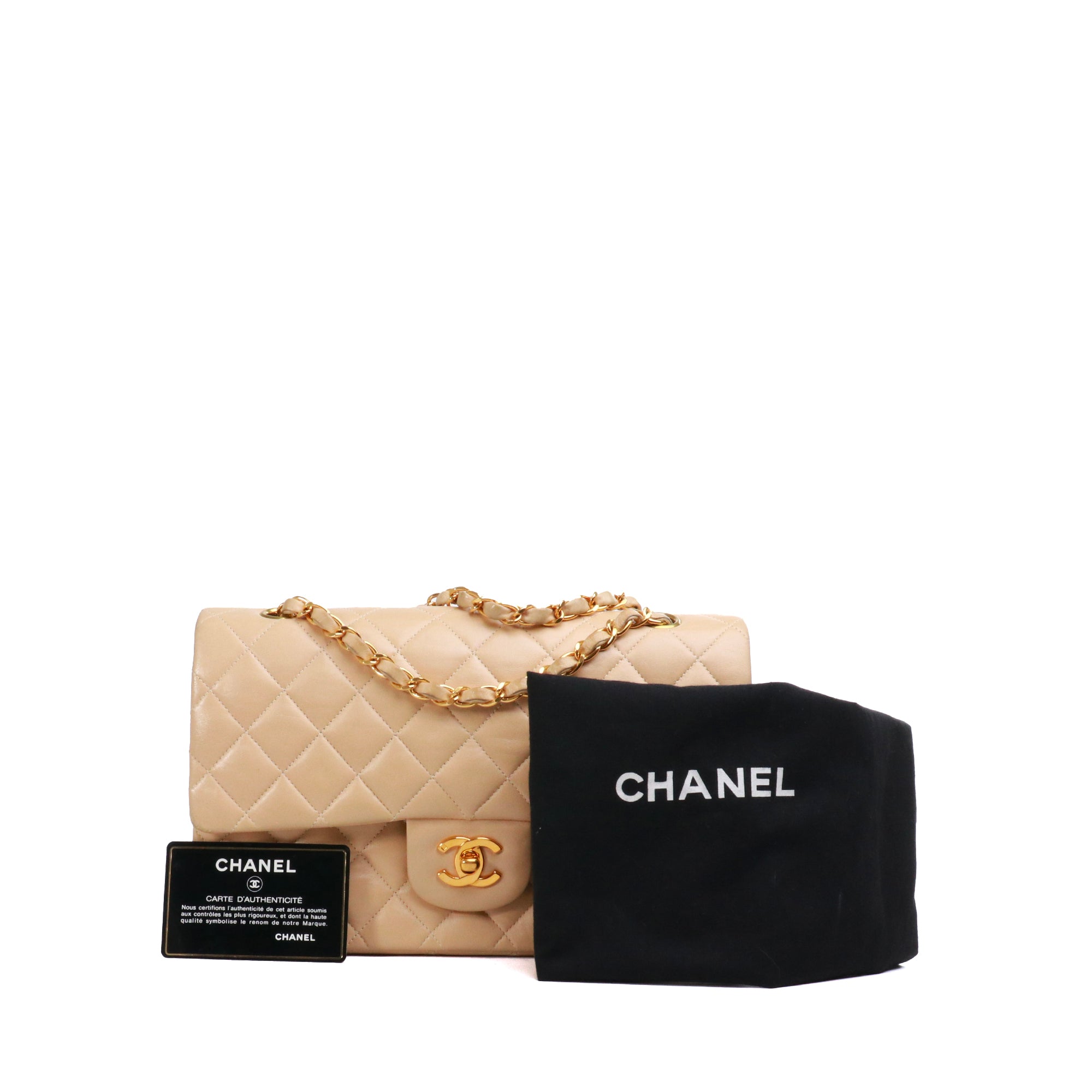 CHANEL - Sac à main Timeless 25 double flap Chanel en cuir matelassé beige vintage