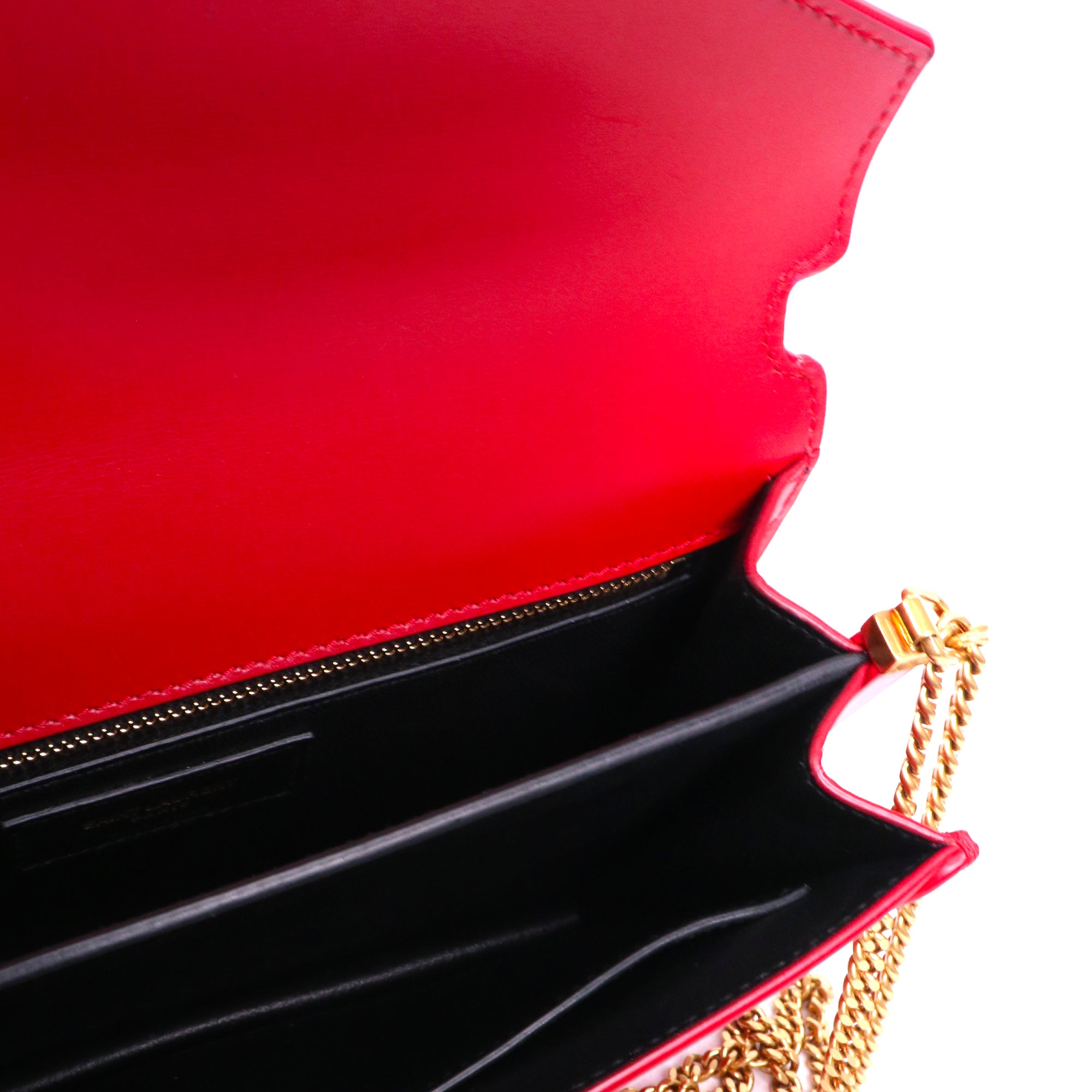 SAINT LAURENT - Sac à bandoulière Cassandre Saint Laurent en cuir rouge