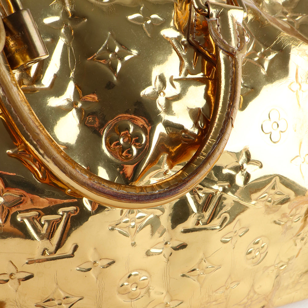 LOUIS VUITTON - Sac à main Speedy 30 en cuir verni miroir doré