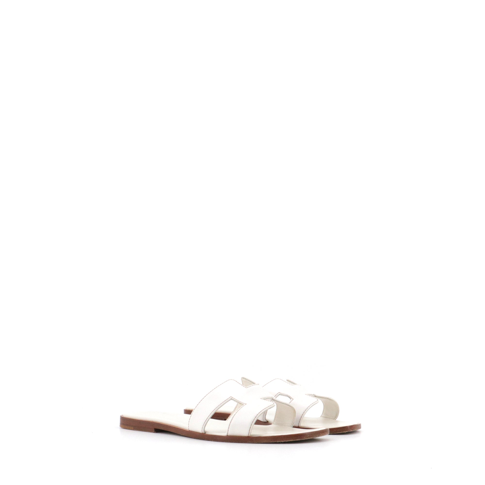 HERMÈS - Sandales Oran Hermès en cuir blanc (T35)