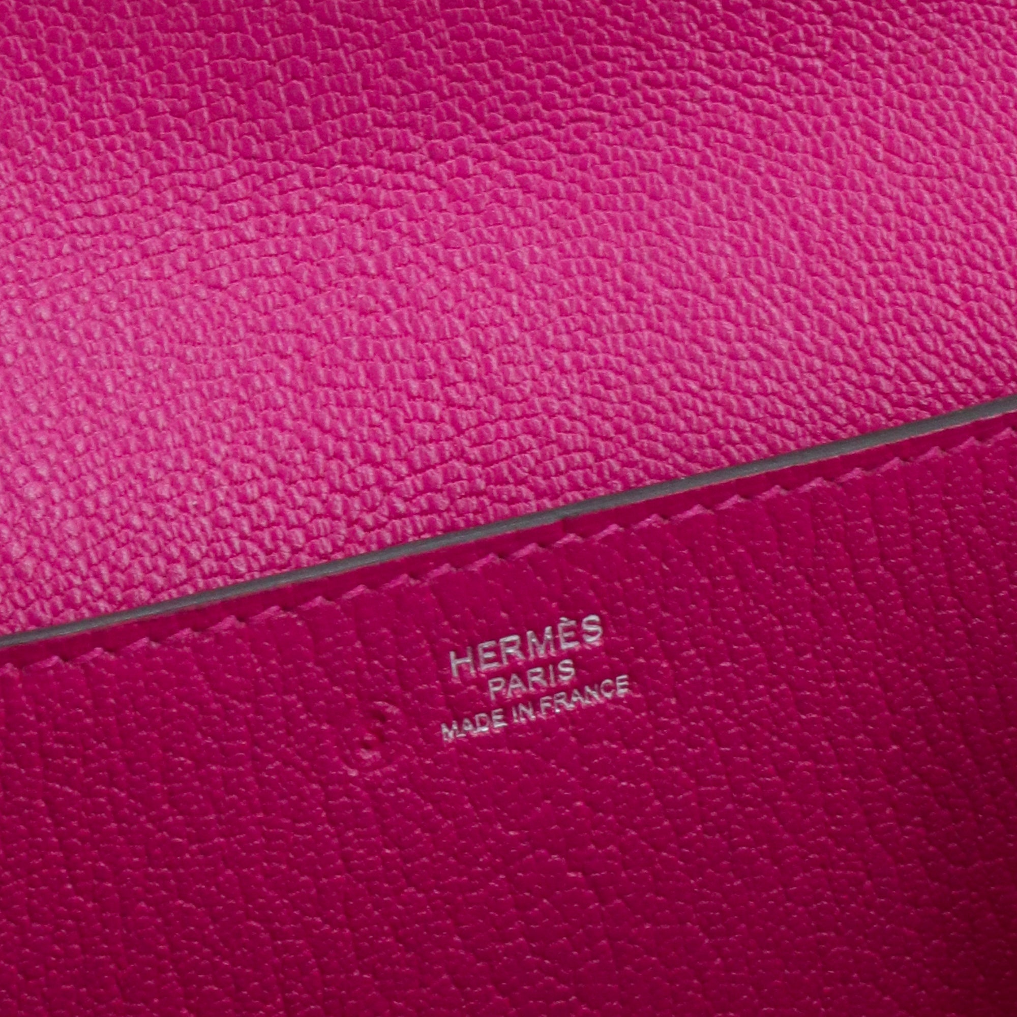 HERMÈS - Pochette Opli Hermès en cuir de chèvre rose pourpre