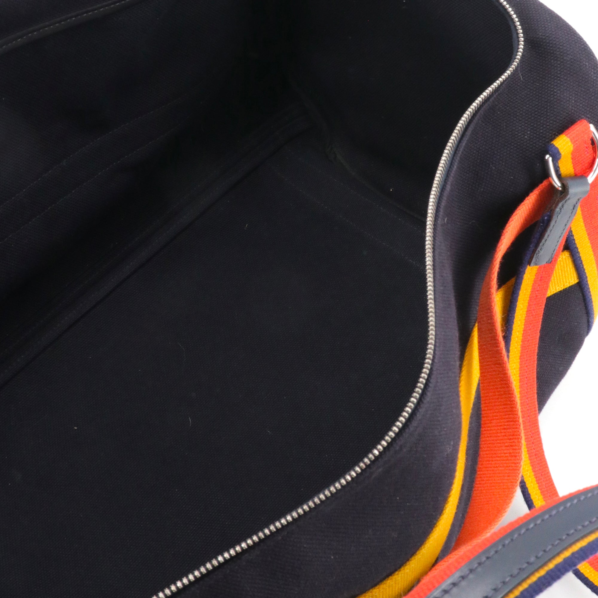 HERMÈS - Sac de voyage Bridleback Hermès en toile bleu marine