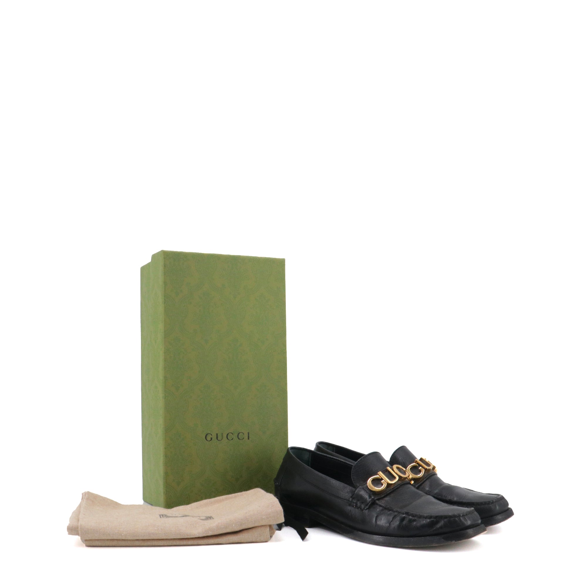 GUCCI - Mocassins Gucci en cuir noir (T39)