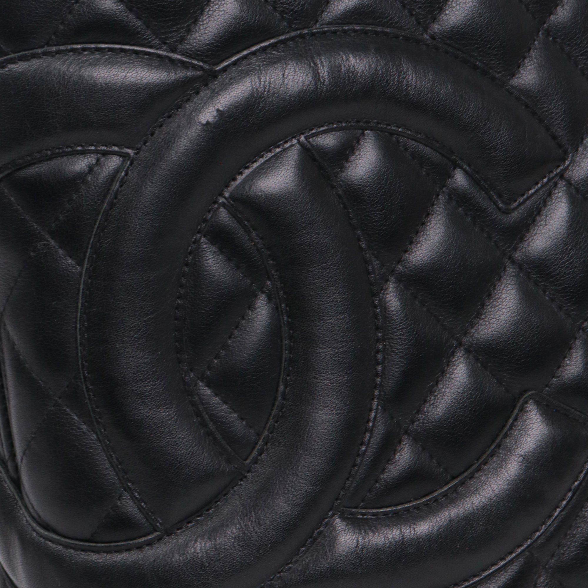 CHANEL - Cambon handbag in beige and black quilted leather
