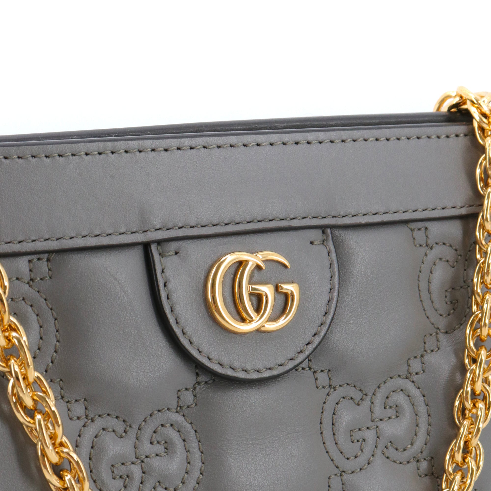 GUCCI - Sac à bandoulière GG Gucci en cuir matelassé gris