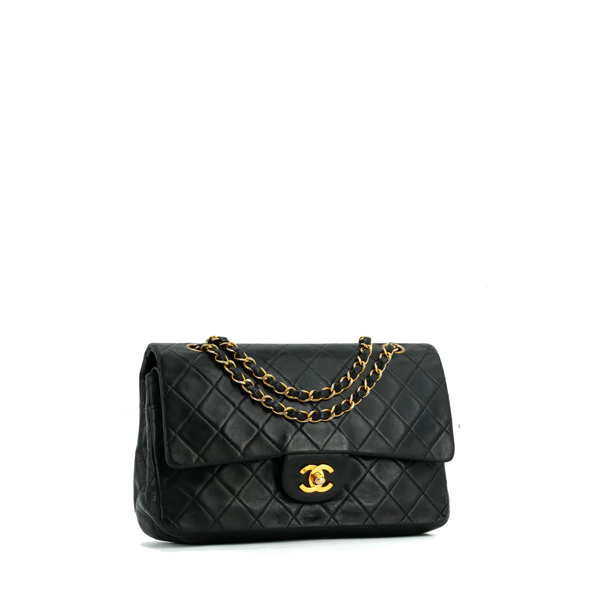 CHANEL - Sac à main Classique/Timeless medium Chanel en cuir matelassé noir vintage