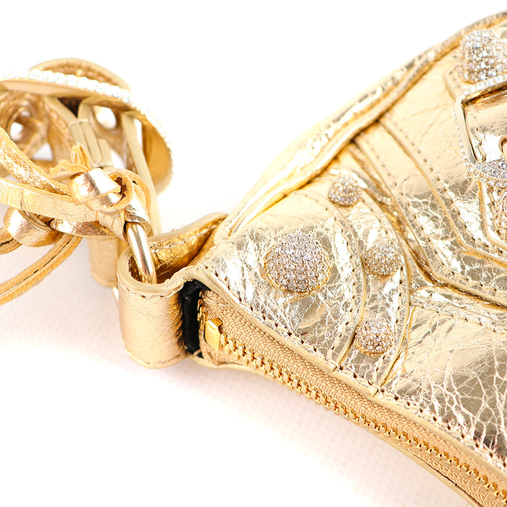 BALENCIAGA - Cagole XS rhinestone shoulder bag in gold leather