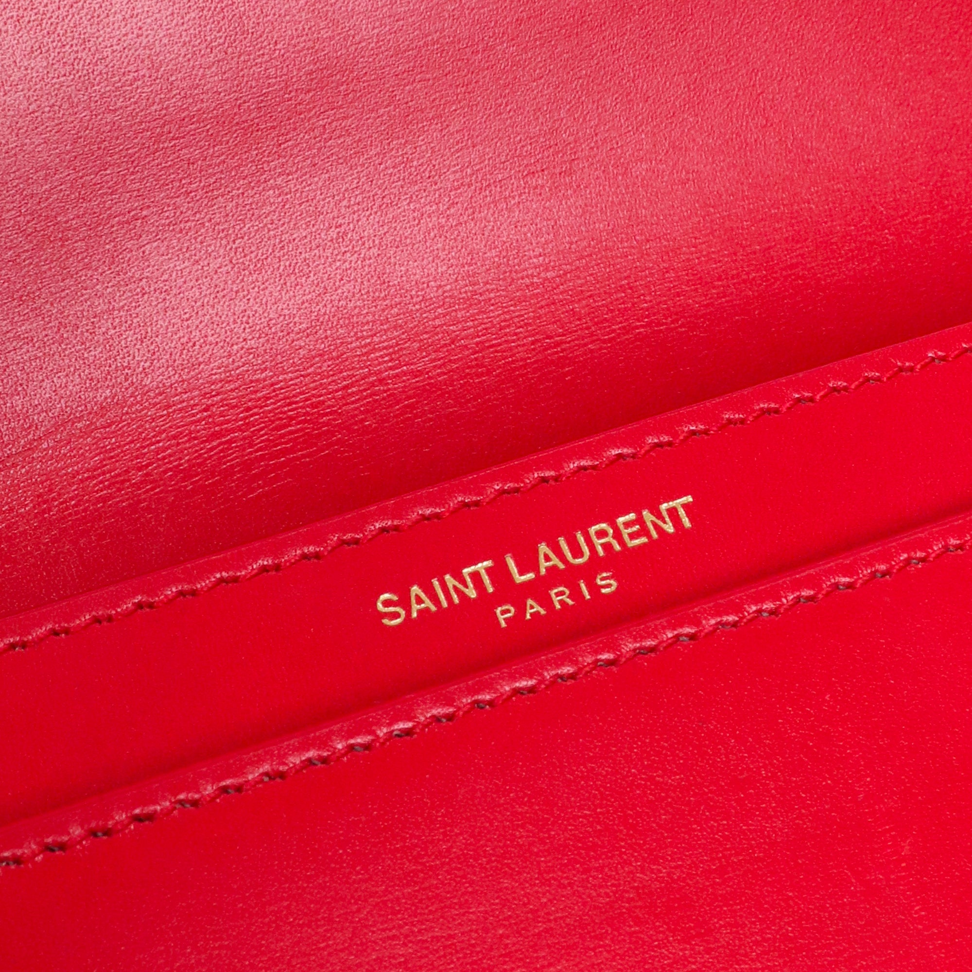 SAINT LAURENT - Sac à bandoulière Cassandre Saint Laurent en cuir rouge