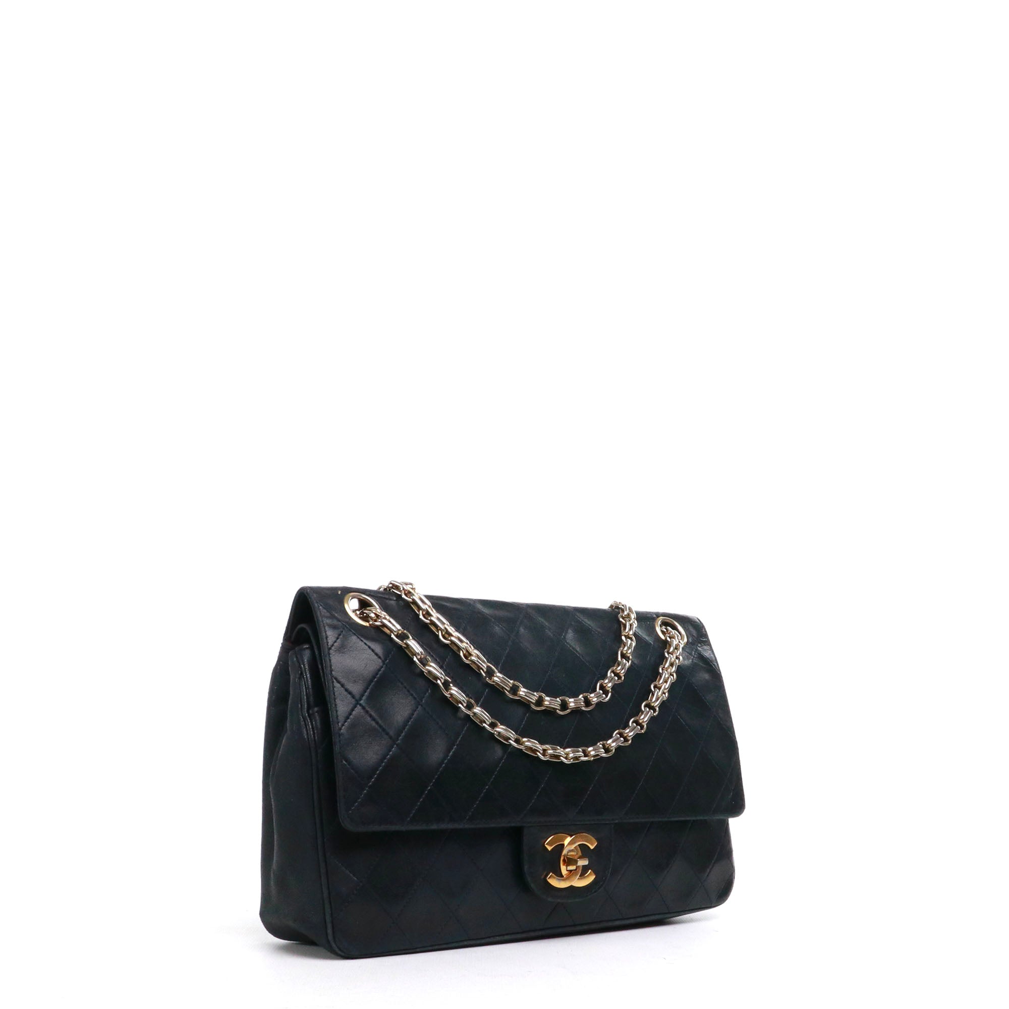 CHANEL - Sac à main Timeless 25 double flap en cuir matelassé noir vintage