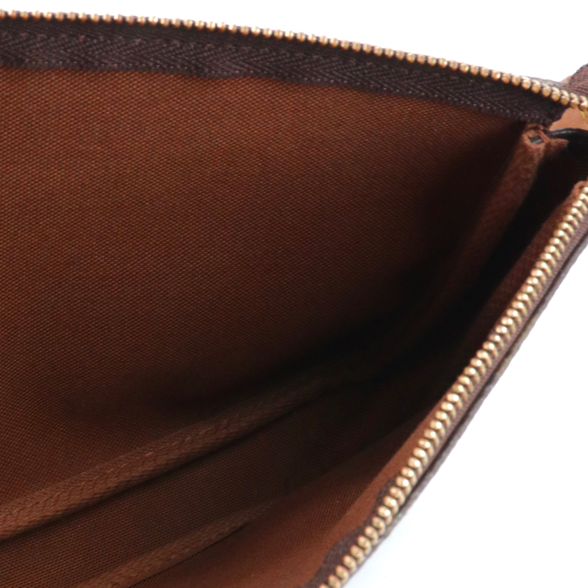 LOUIS VUITTON - Pochette Accessoires Louis Vuitton en toile monogrammée