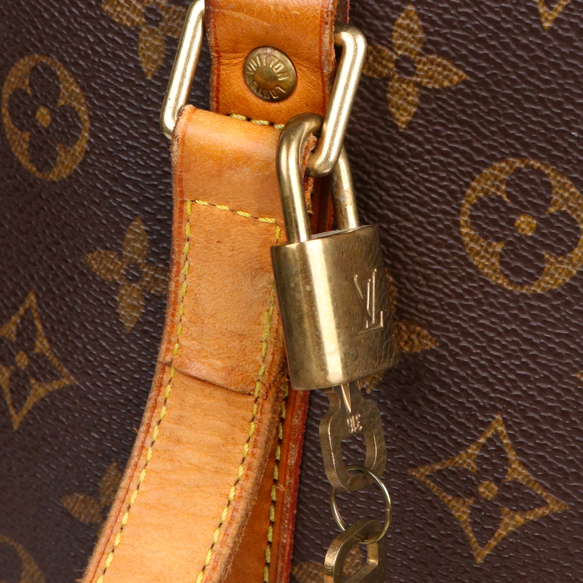 LOUIS VUITTON - Sac cabas Babylone Louis Vuitton en toile monogrammée marron vintage