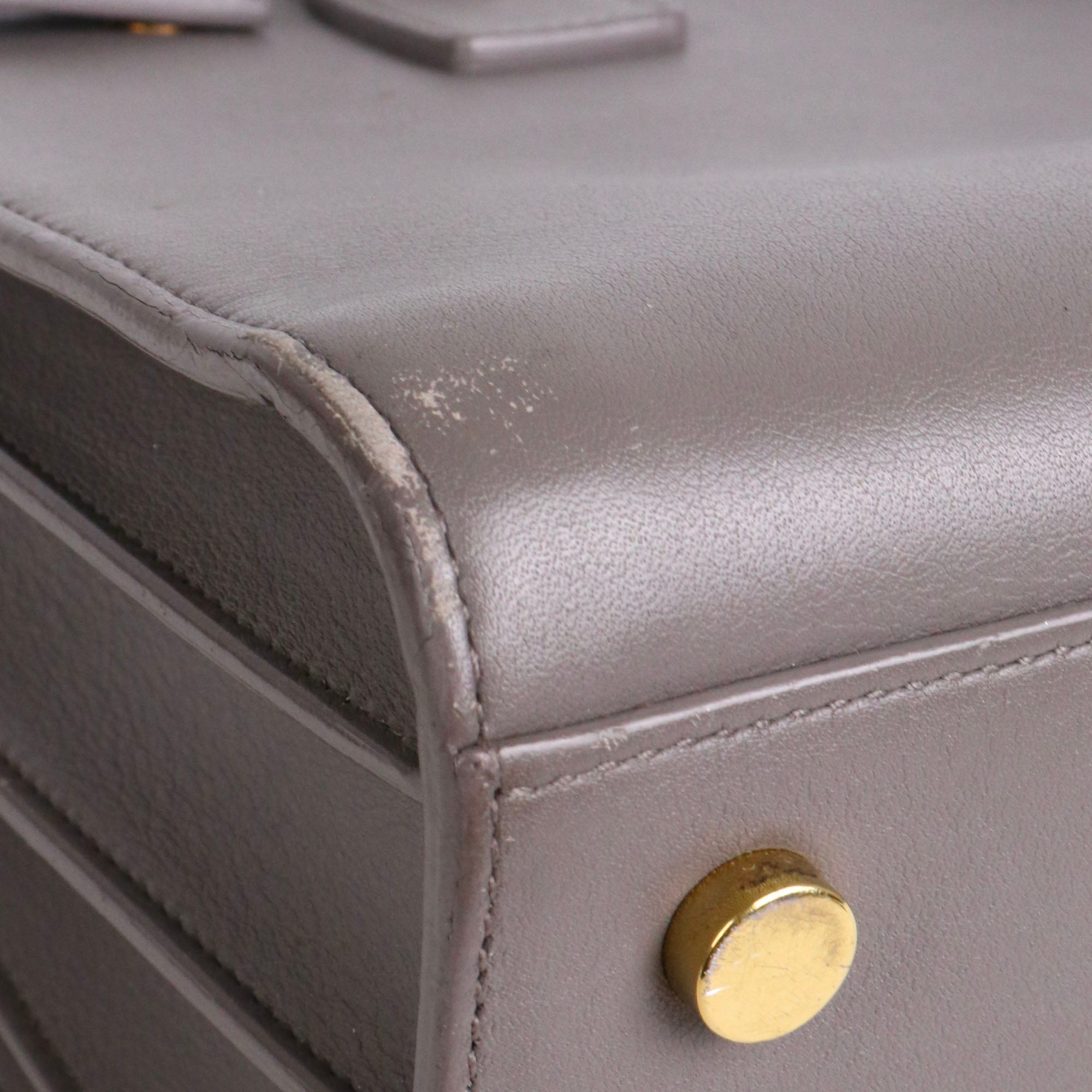 SAINT LAURENT - Sac de Jour Baby Saint Laurent en cuir lisse gris