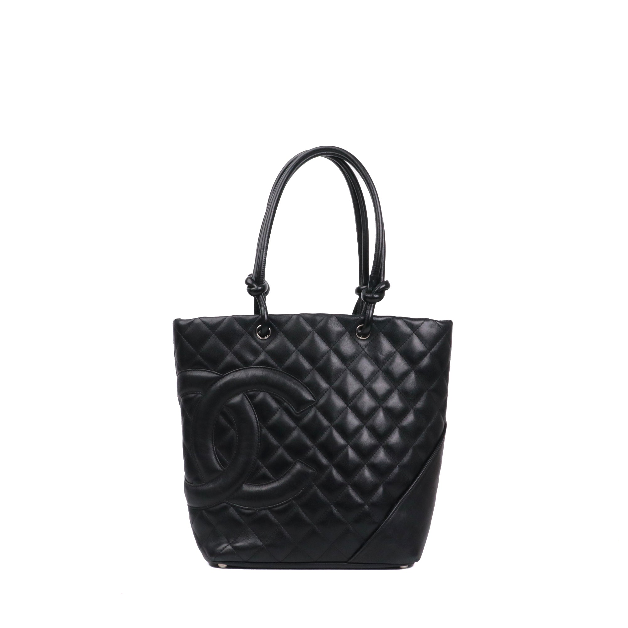 CHANEL - Cambon handbag in beige and black quilted leather