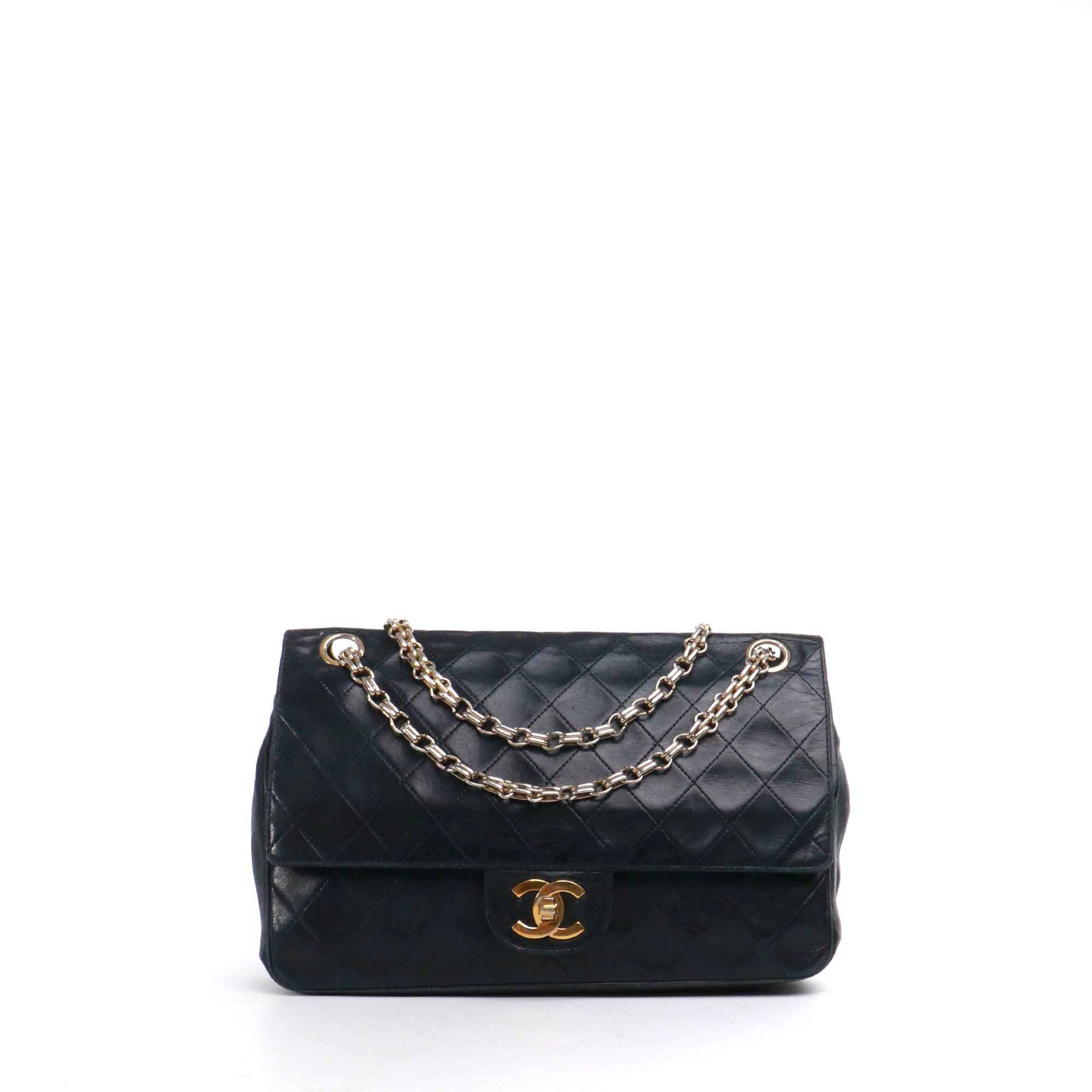 CHANEL - Sac à main Timeless 25 double flap en cuir matelassé noir vintage