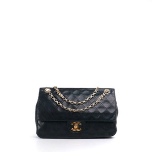 CHANEL - Sac à main Timeless 25 double flap en cuir matelassé noir vintage