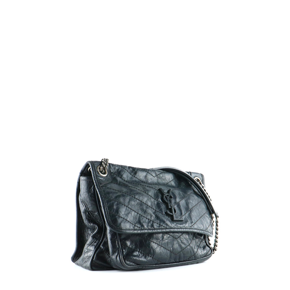 SAINT LAURENT - Sac à bandoulière Niki Medium en cuir noir