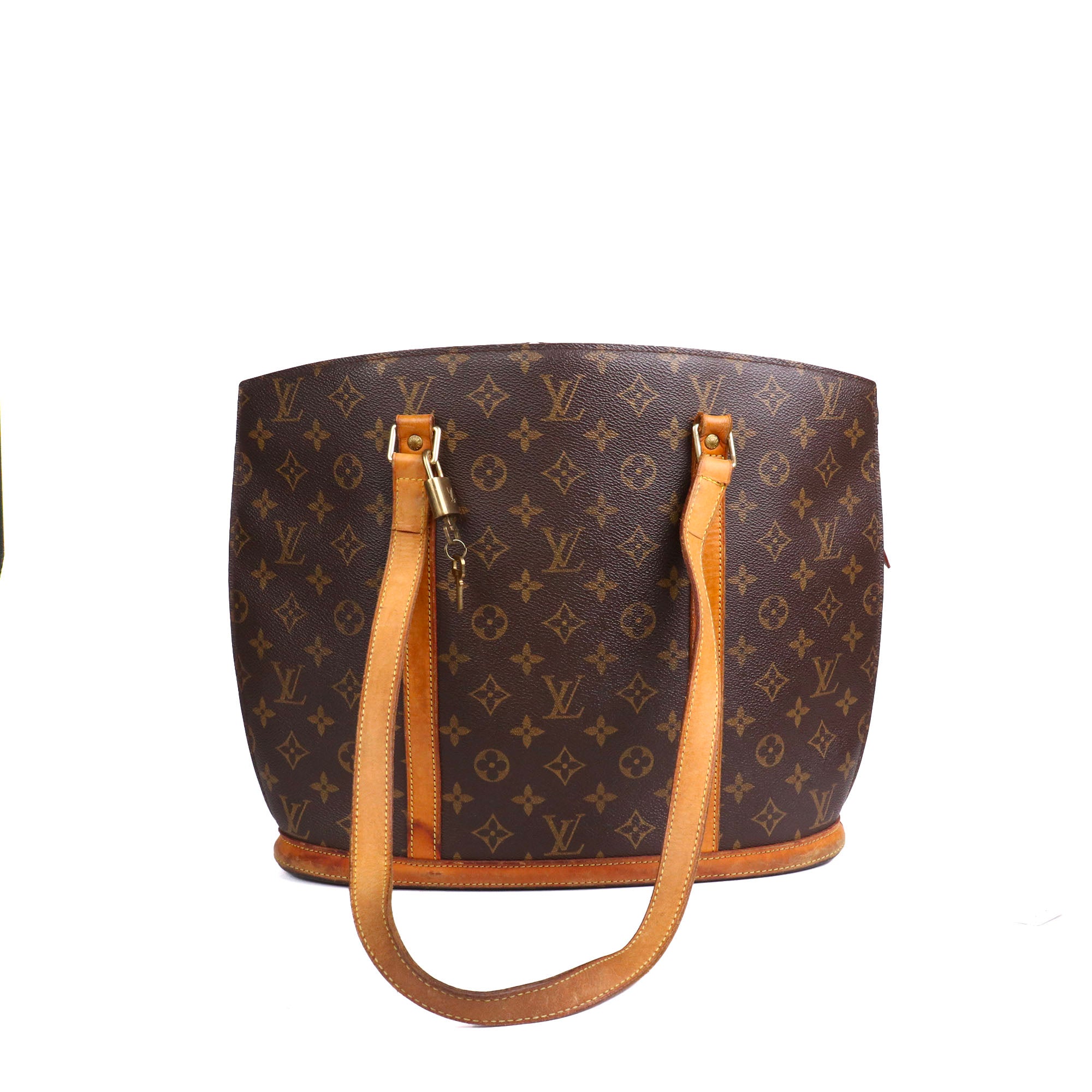 LOUIS VUITTON - Sac cabas Babylone Louis Vuitton en toile monogrammée marron vintage