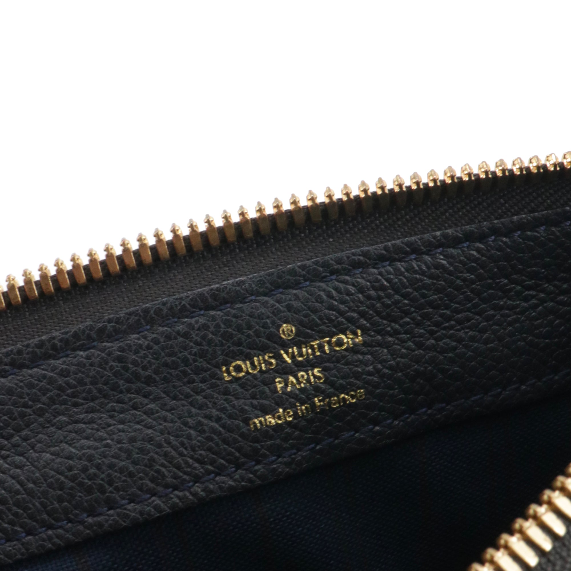 LOUIS VUITTON - Pochette Pétillante Louis Vuitton en cuir empreinte bleu marine