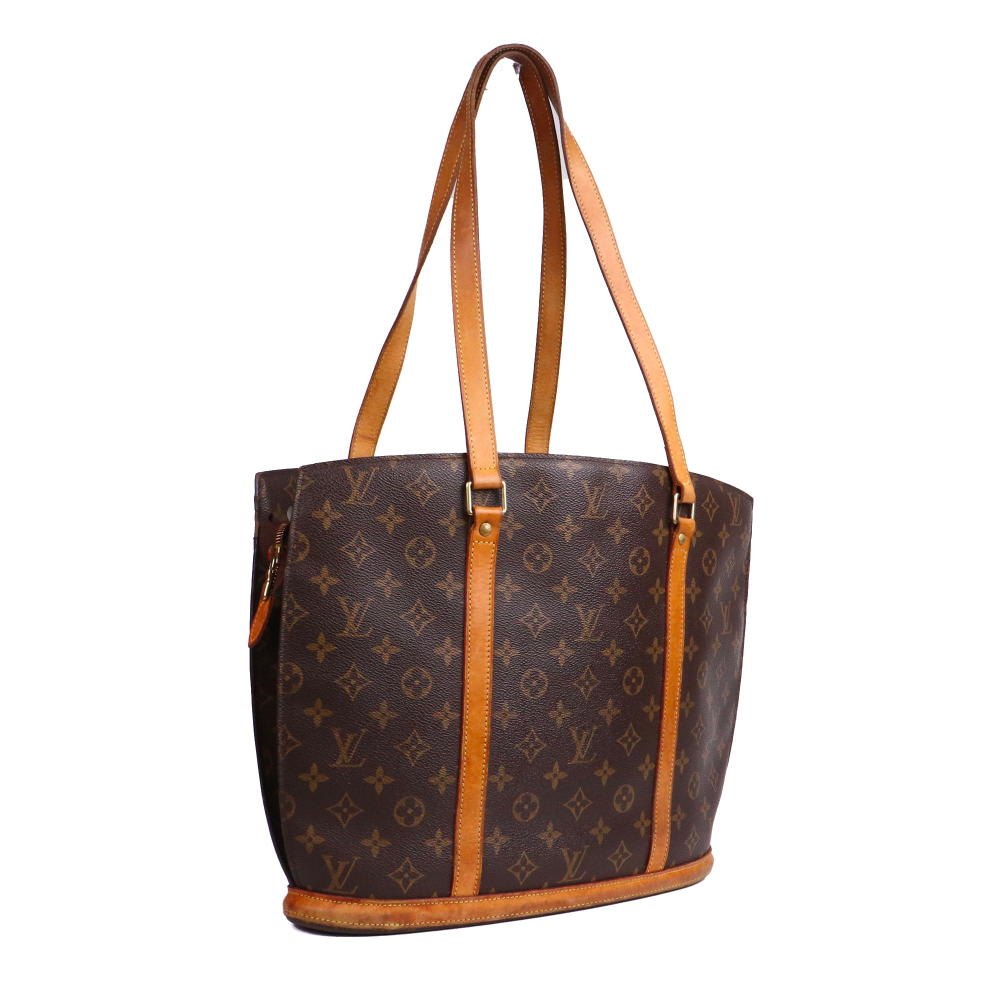 LOUIS VUITTON - Sac cabas Babylone Louis Vuitton en toile monogrammée marron vintage