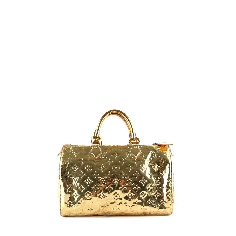 LOUIS VUITTON - Sac à main Speedy 30 en cuir verni miroir doré