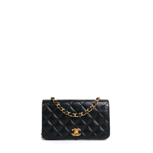 CHANEL - Sac à bandoulière Mademoiselle vintage Chanel en cuir matelassé noir