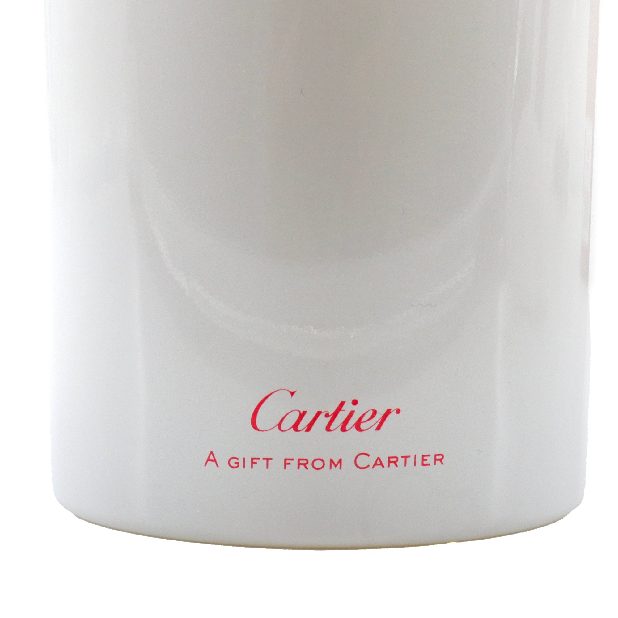 CARTIER - Bougie parfumée Cartier en verre blanc et rouge