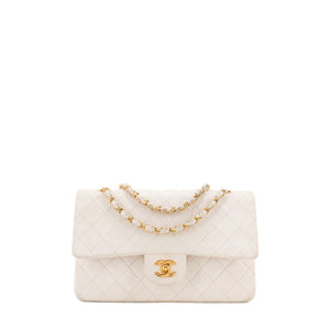 CHANEL - Sac à main Classique/Timeless 11.12 Chanel en cuir blanc vintage