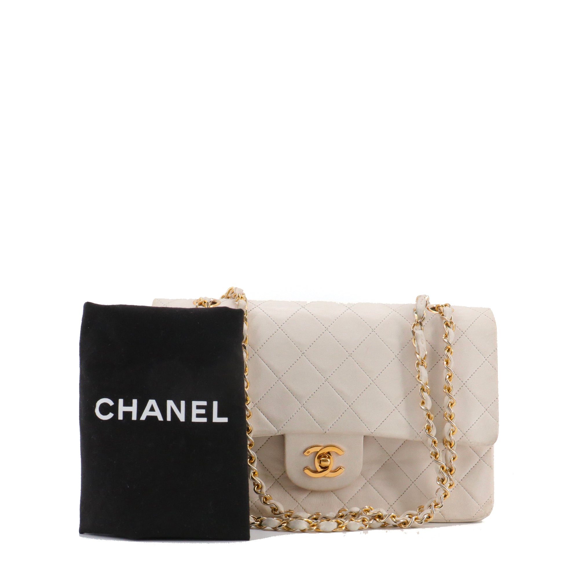 CHANEL - Sac à main Classique/Timeless 11.12 Chanel en cuir blanc vintage