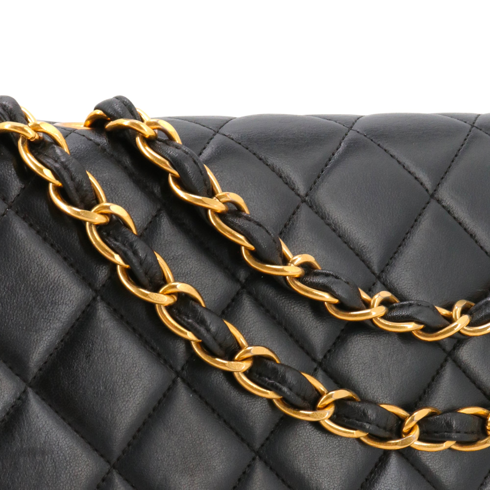 CHANEL - Sac à bandoulière Classique/Timeless Jumbo Chanel en cuir lisse noir vintage
