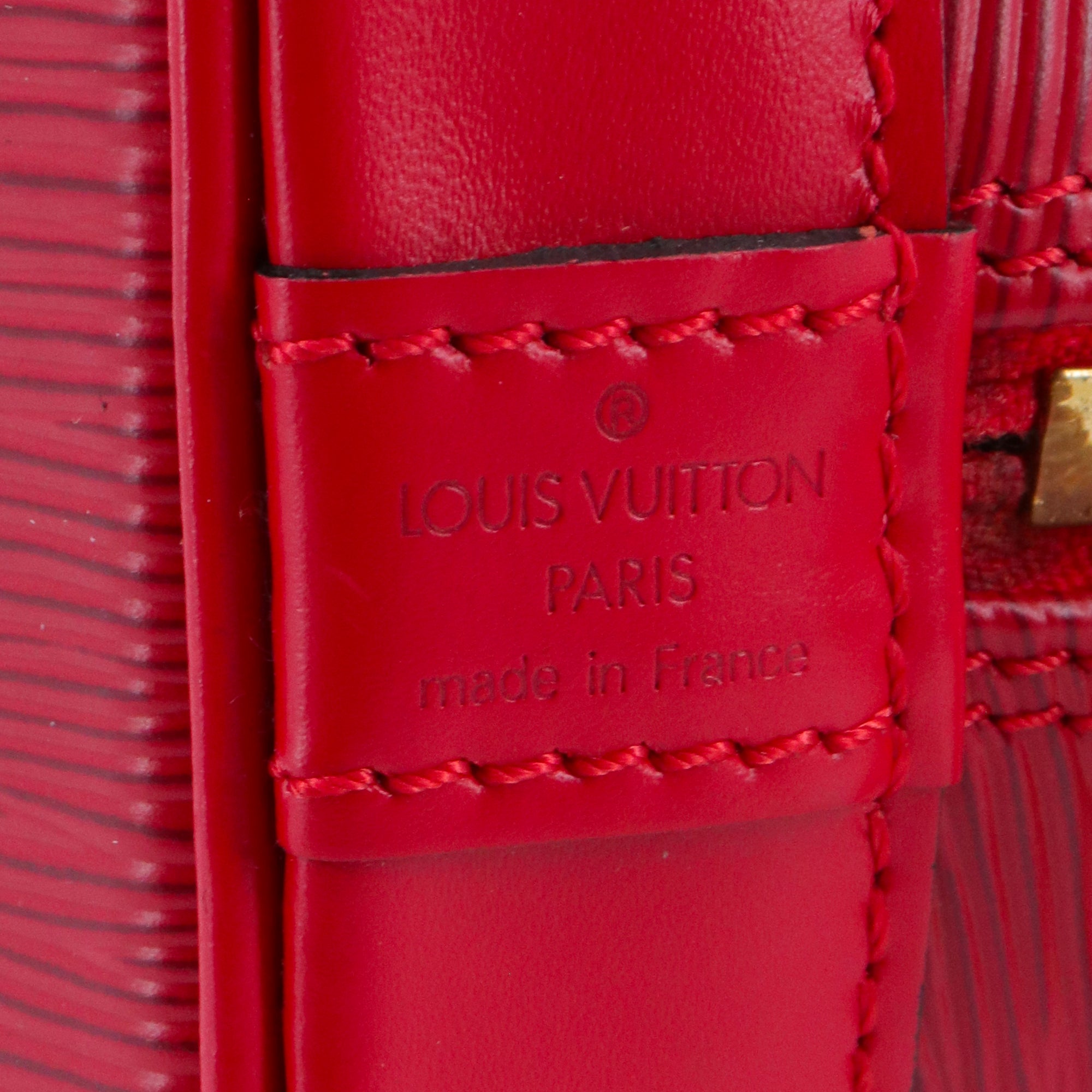 LOUIS VUITTON - Sac à main Alma PM Louis Vuitton en cuir épi rouge vintage