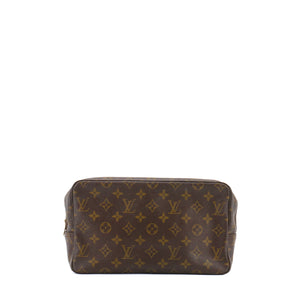 LOUIS VUITTON - Trousse de toilette Louis Vuitton en toile enduite vintage