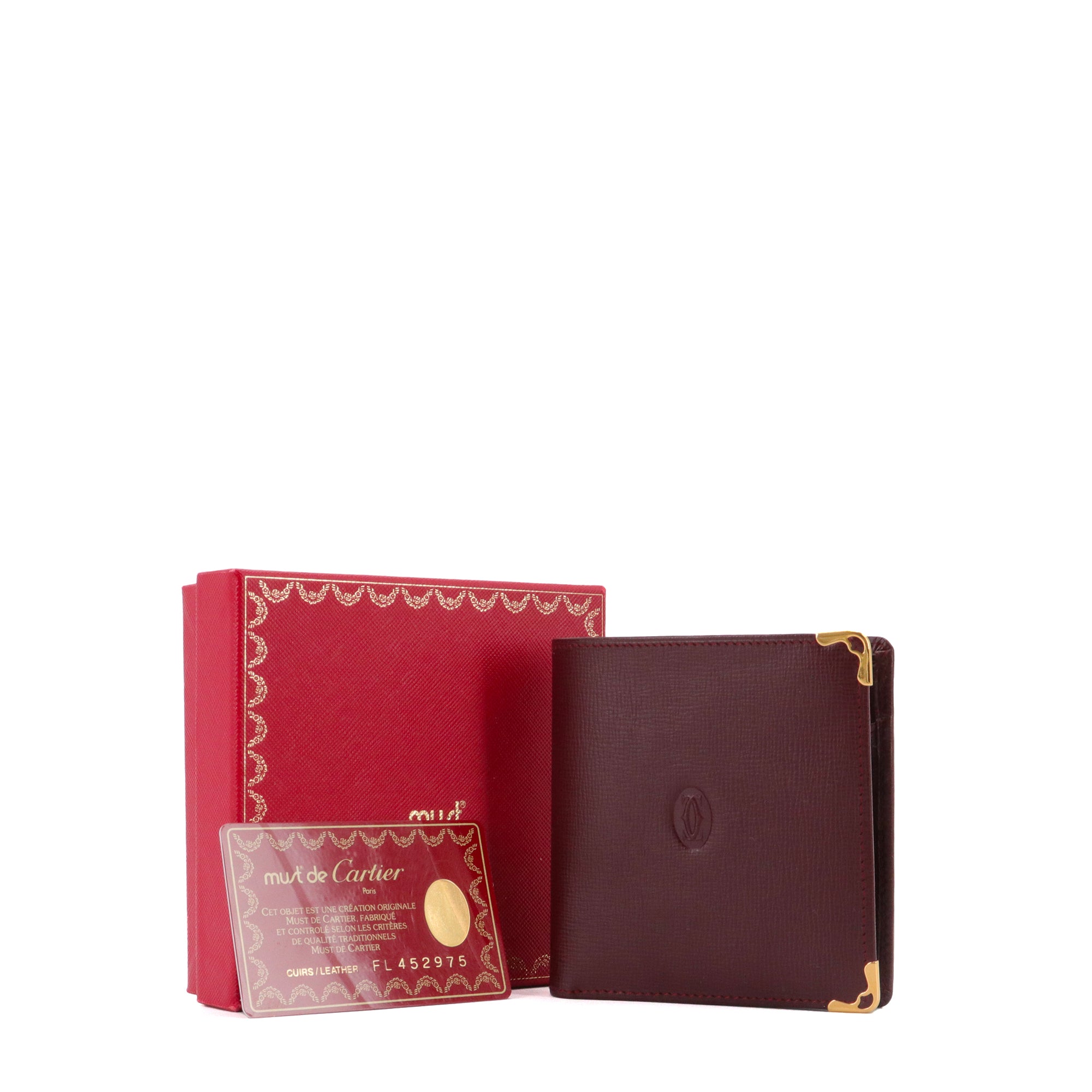 CARTIER - Portefeuille Multiple Must Cartier en cuir grainé bordeaux