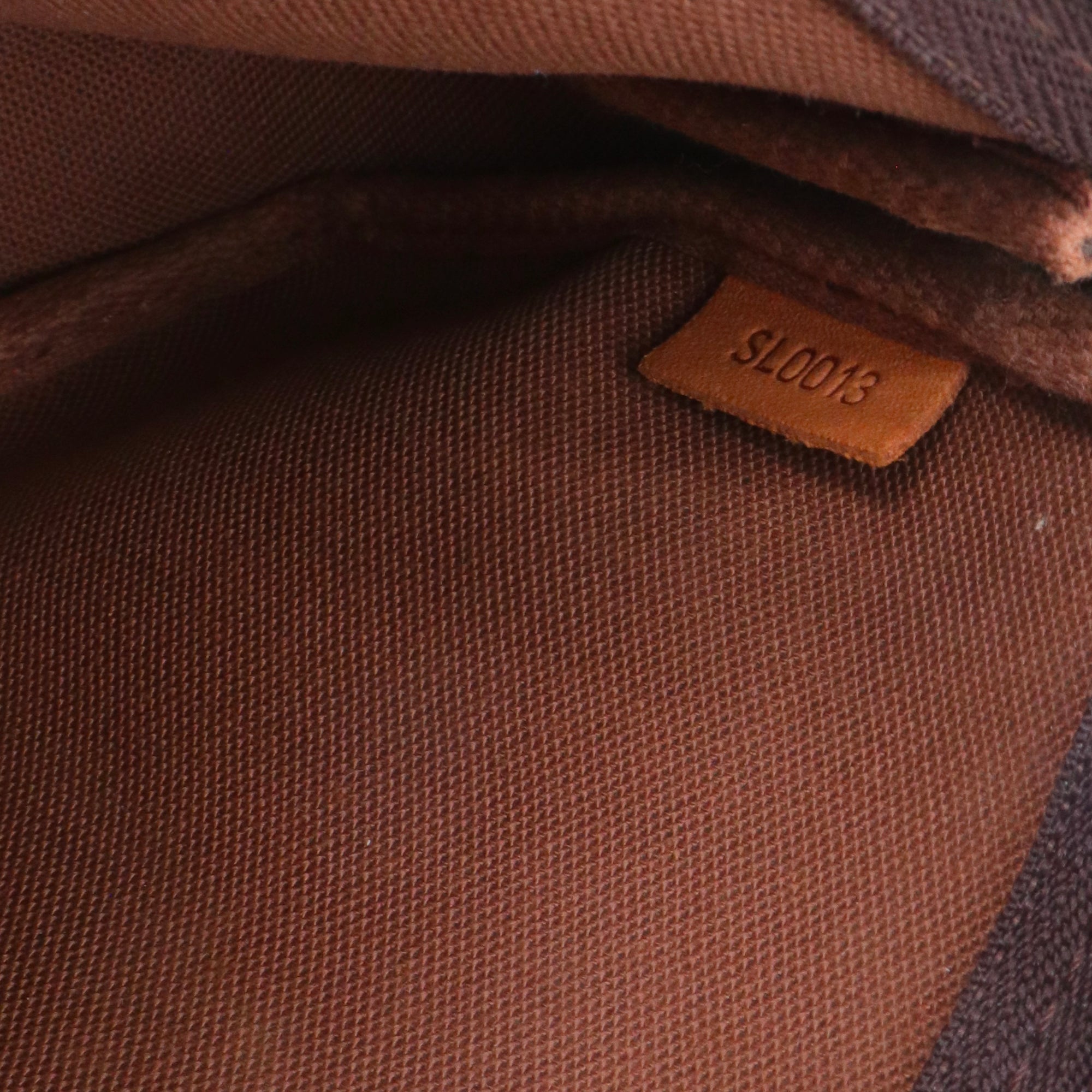 LOUIS VUITTON - Pochette Accessoires Louis Vuitton en toile monogrammée