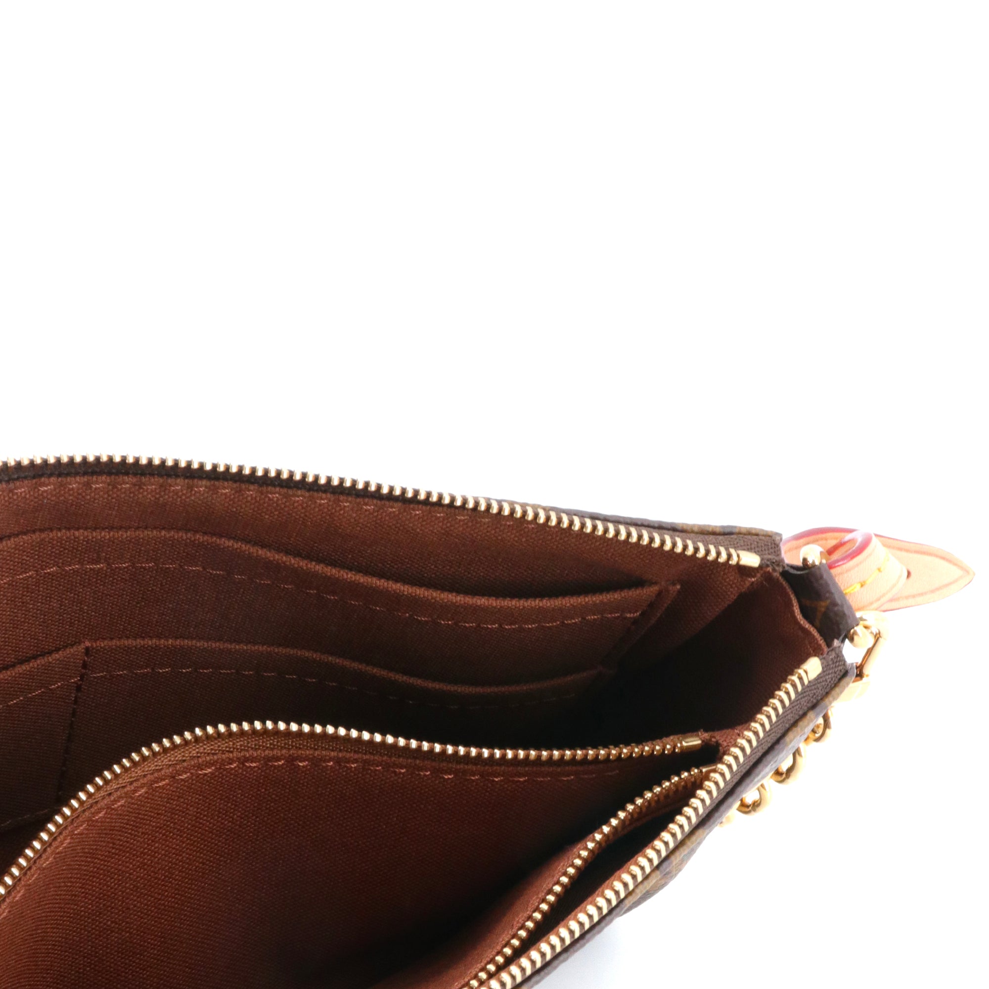 LOUIS VUITTON - Pochette Accessoires Louis Vuitton en toile monogrammée