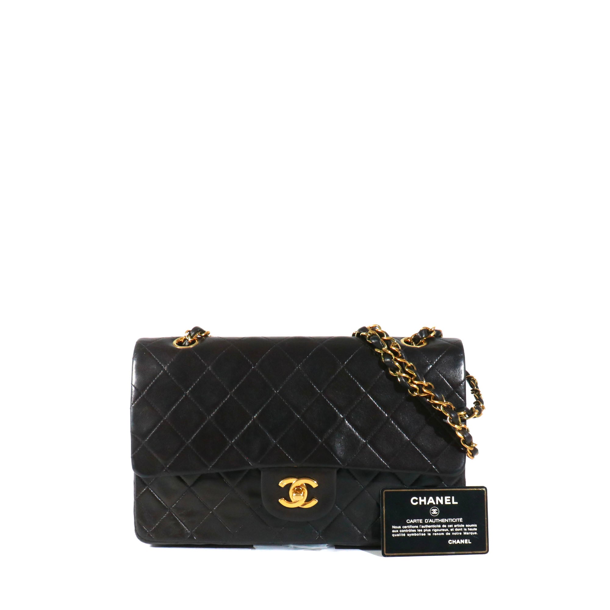 CHANEL - Sac à main Timeless 25 double flap Chanel en cuir matelassé noir vintage