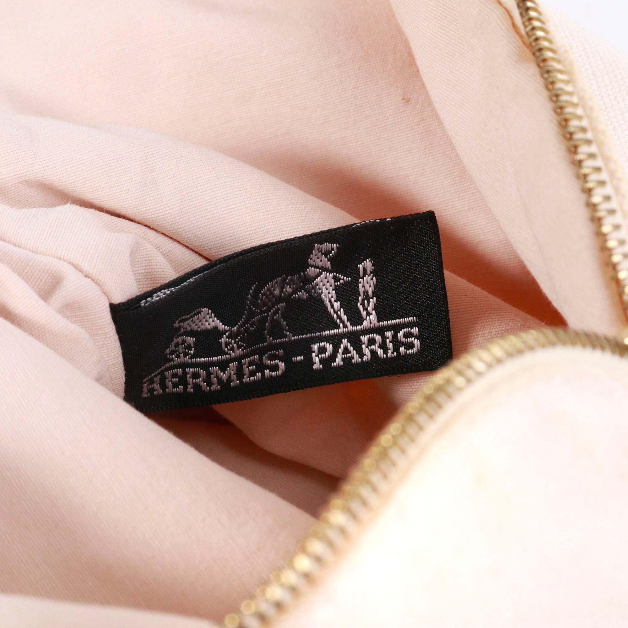 HERMÈS - Trousse de toilette Bolide Hermès en toile beige