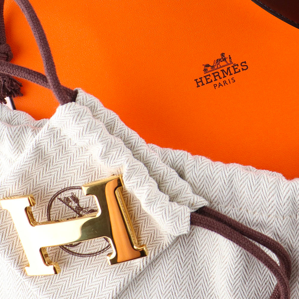 HERMÈS - Ceinture réversible H avec boucle dorée (T90)